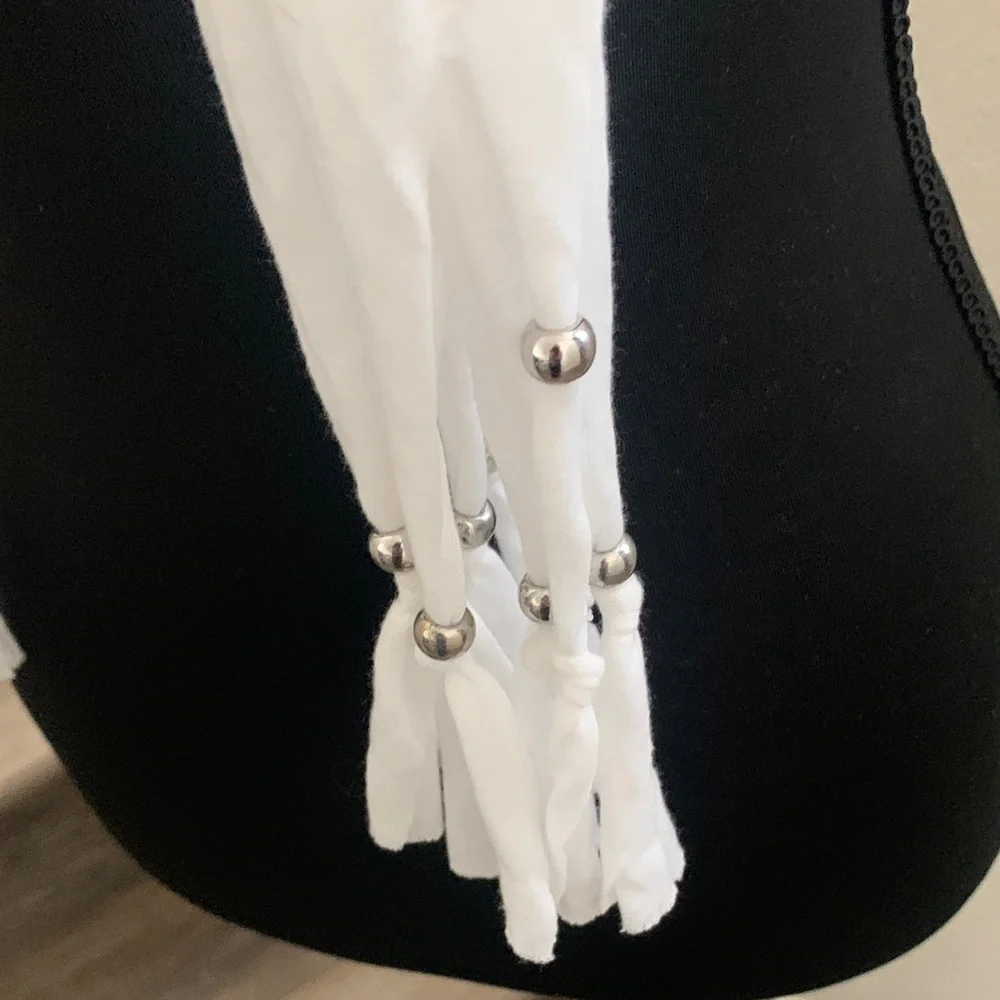 NWOT Chic White Scarf Necklace with Fleur-de-Lis Pendant.